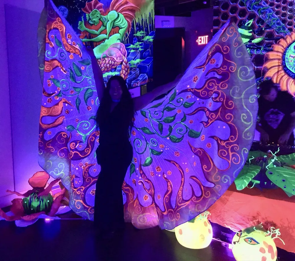 Lorenda performing with LED props