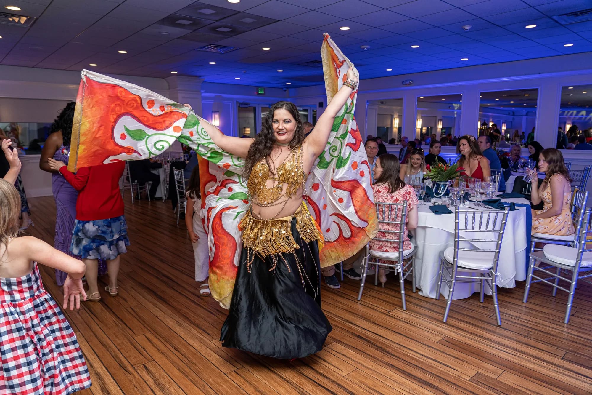 Lorenda belly dancing at a wedding celebration