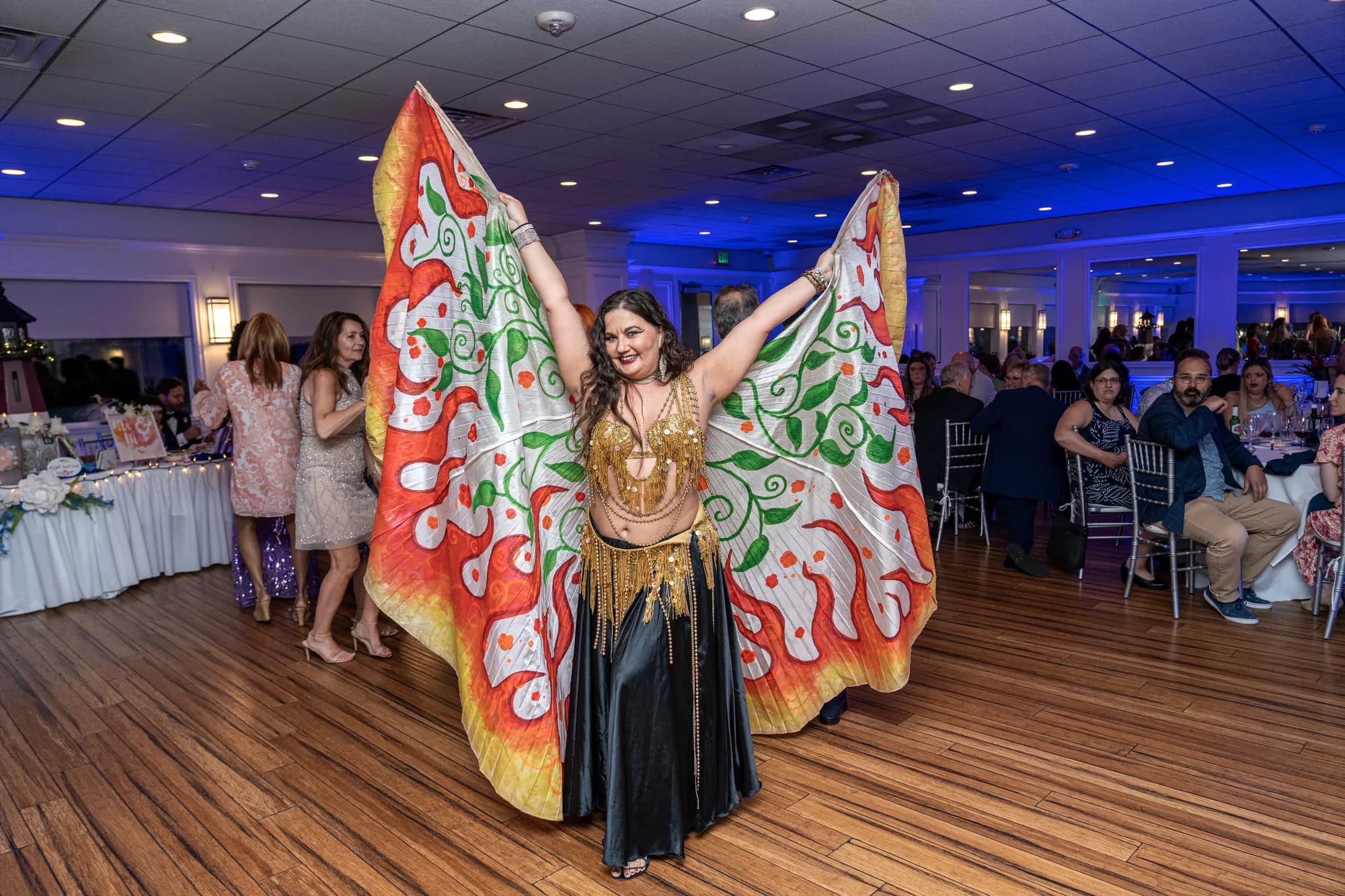 Lorenda belly dancing at a wedding celebration