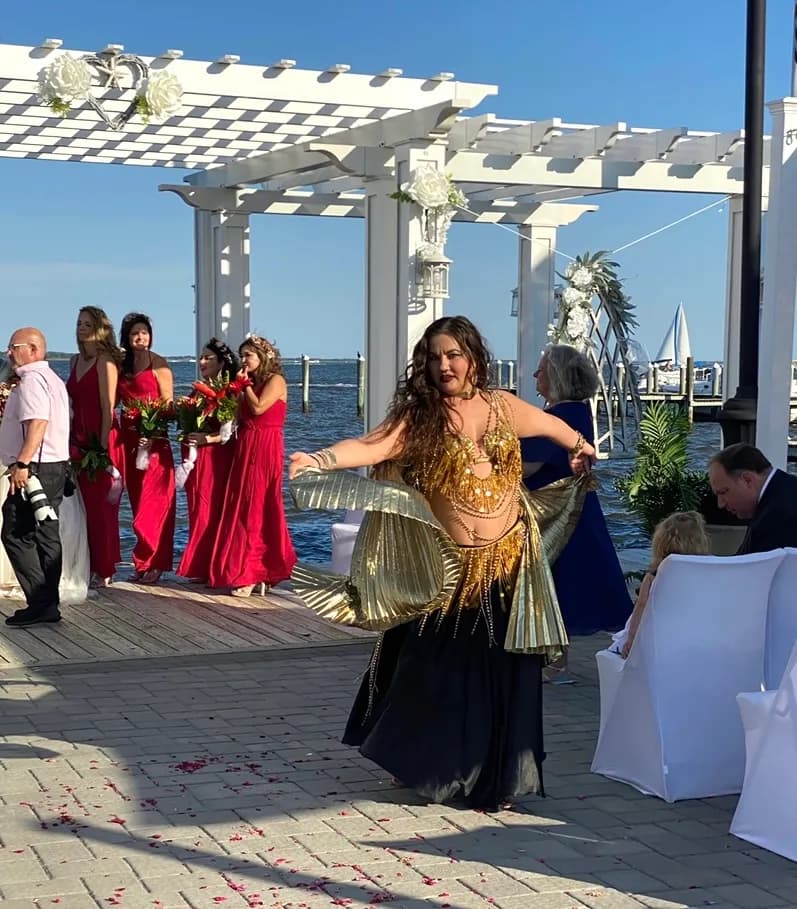 Lorenda belly dancing at a wedding celebration