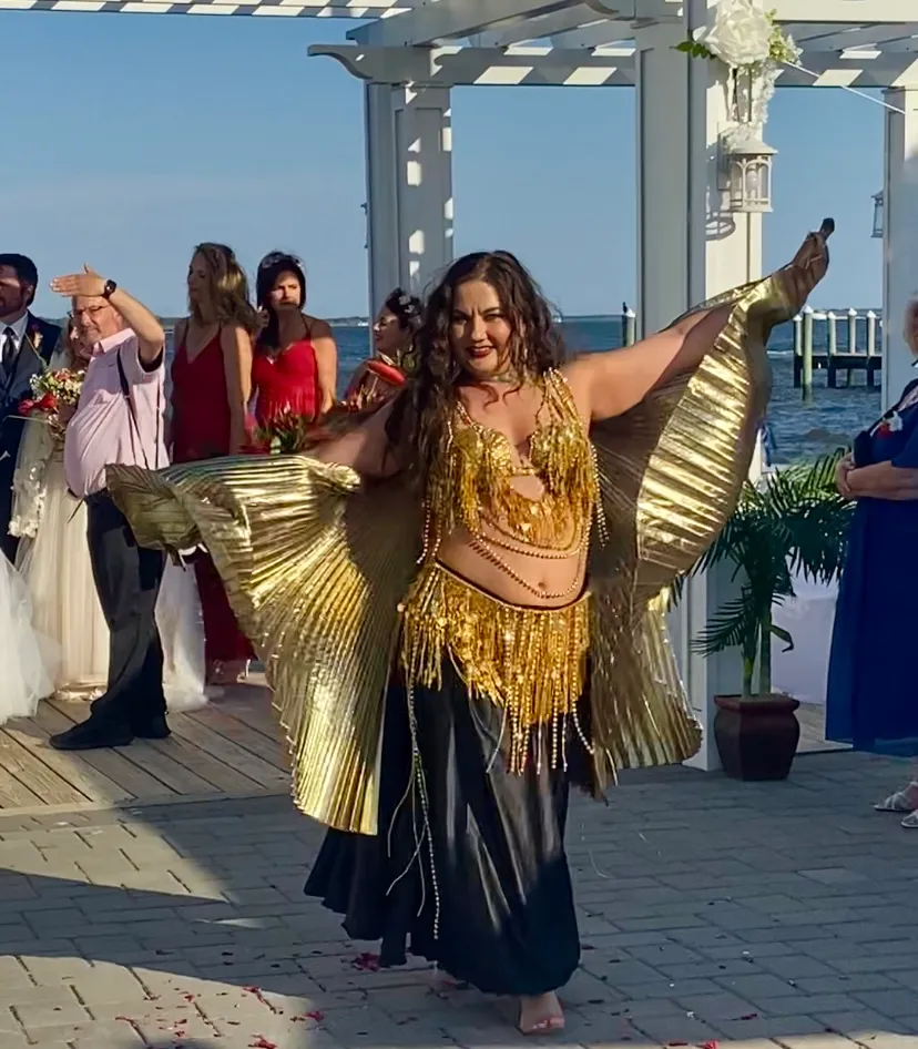 Lorenda belly dancing at a wedding celebration