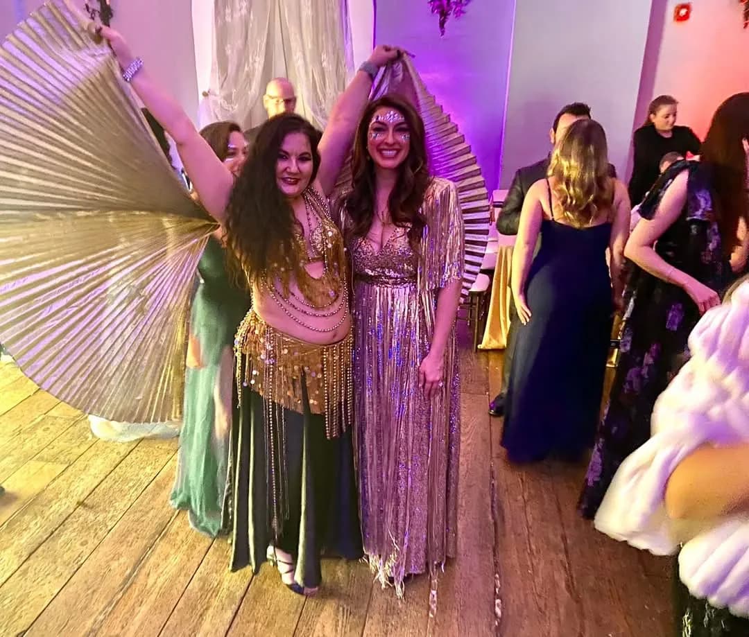 Lorenda belly dancing at a wedding celebration